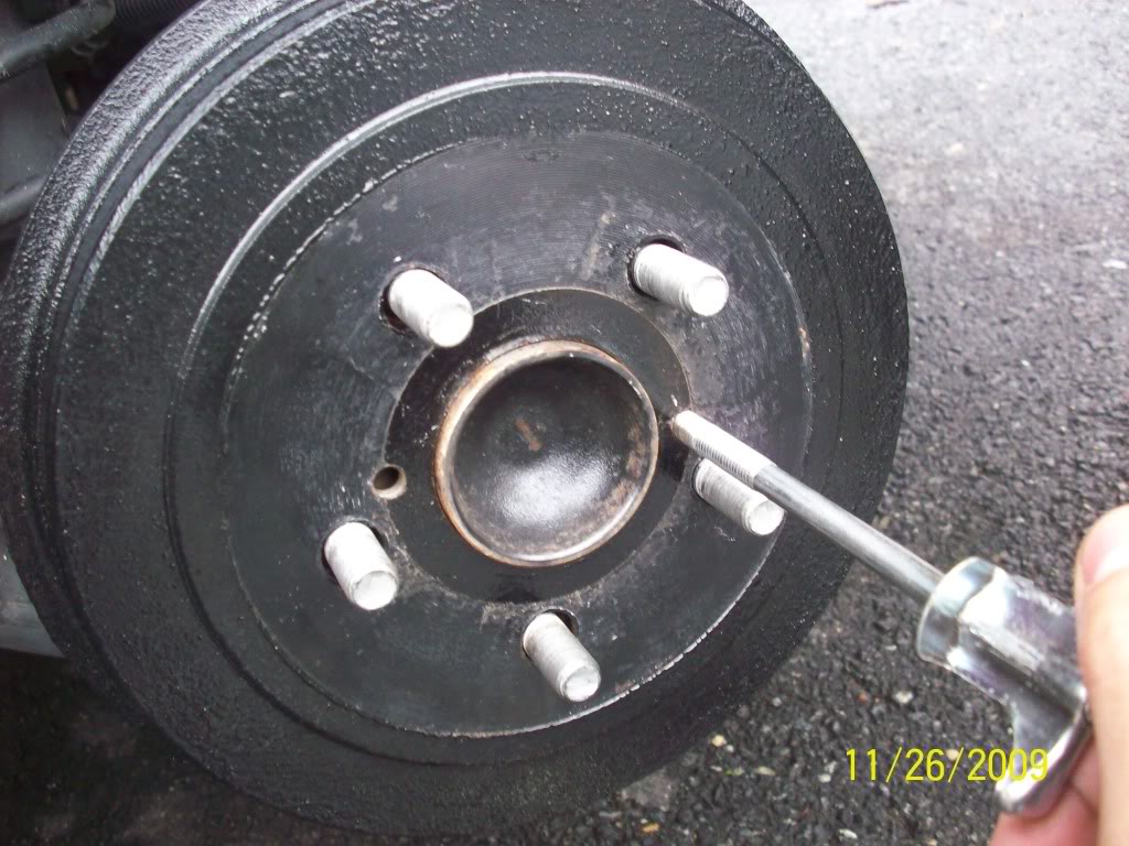 cace64b63c459c2d87e1b4772a7d666b  Removing, cleaning and adjusting rear drum brakes